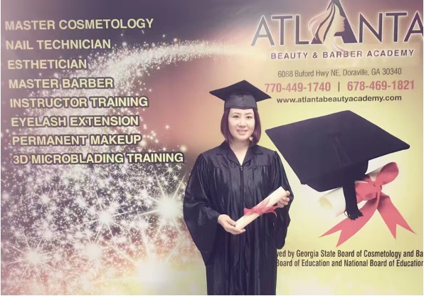 Wendy Yang in cap and gown at the Atlanta Beauty & Barber Academy